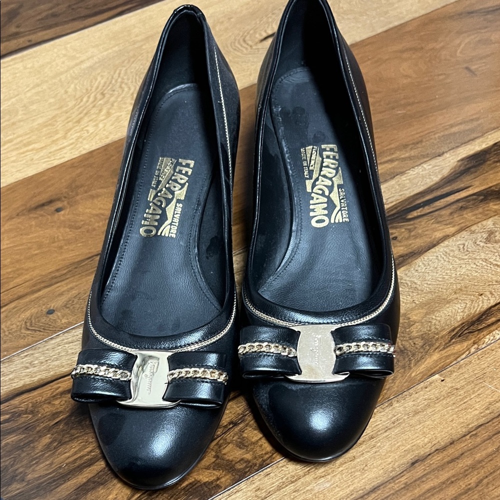 Salvatore Ferragamo Black Flats with Gold Accents